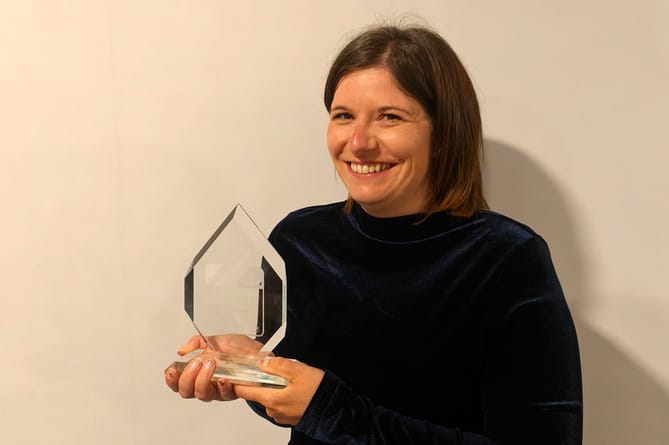 Sandra with her Award